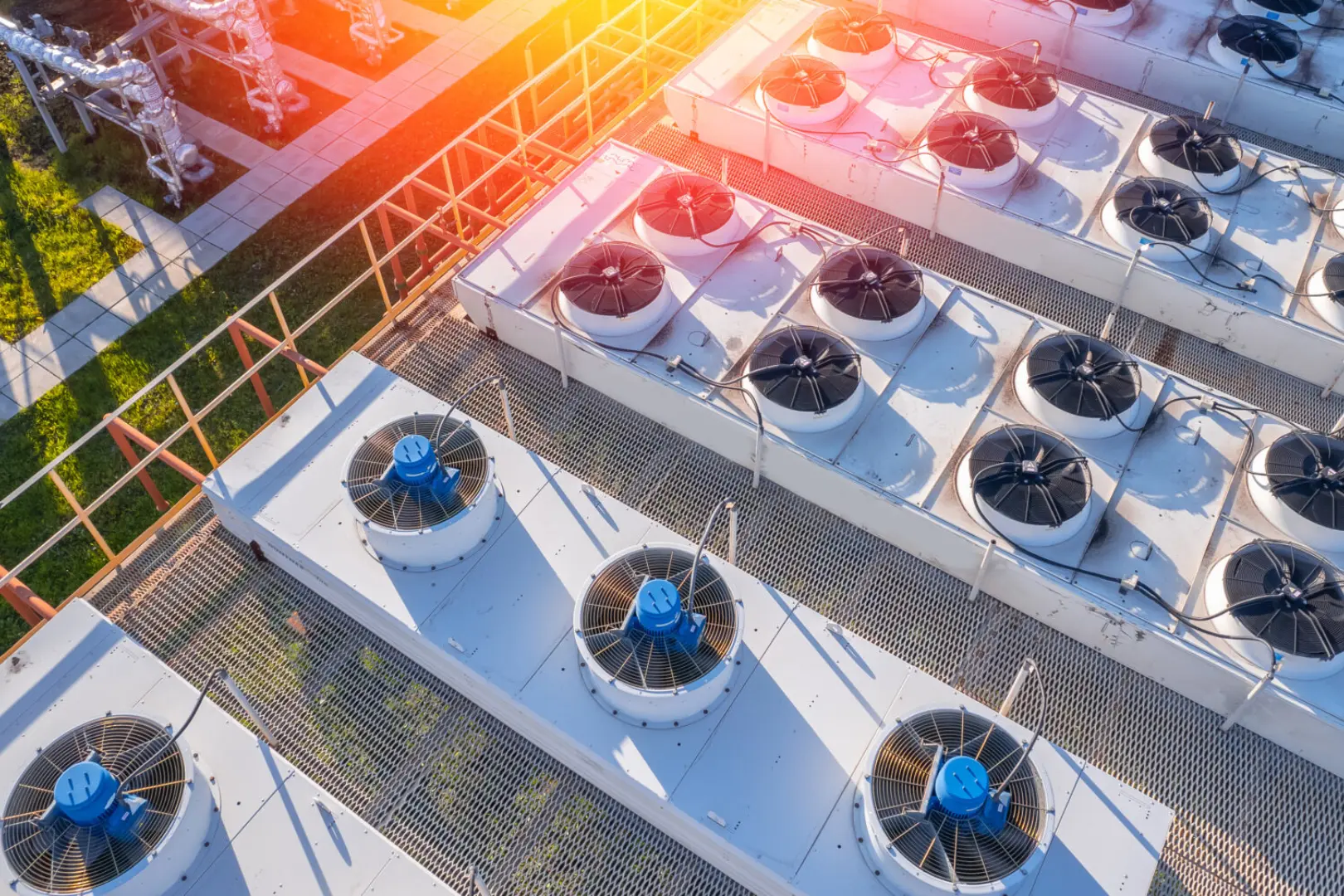 A group of fans that are on top of some buildings.